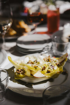 Restaurant Table with Food and Cocktails