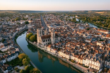 Fototapeta premium Aerial view of Auxerre's historic town center along the Yonne River, France