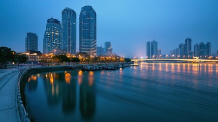 Naklejka premium Evening Panorama of Fuzhou Waterfront: Urban Glow and Classical Riverside Heritage