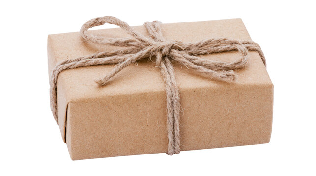 Small gift box wrapped in brown paper with twine string on isolated transparent background as PNG file