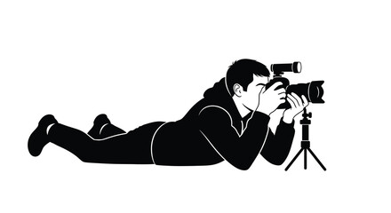 Photographer lying prone with camera and tripod a black silhouette against a white background photography tripod shooting graphic design illustration © Moriom