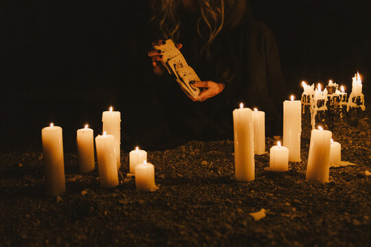 Woman Shuffling Tarot Cards