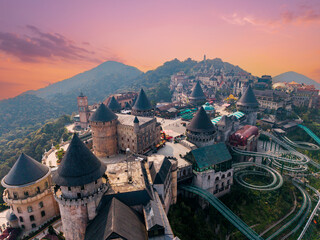 Stunning sunset over ba na hills castle complex in Da nang Vietnam
