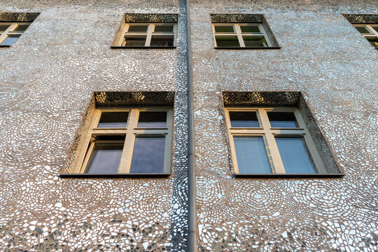 Low Angle View of the Unique Mirror Mosaic Facade with Windows at the Famous Rose Passage in Lodz Poland