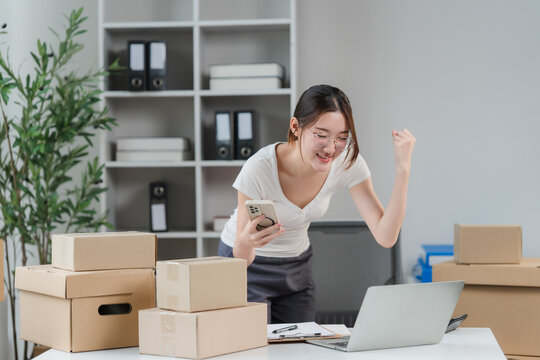 young woman unpacking boxes