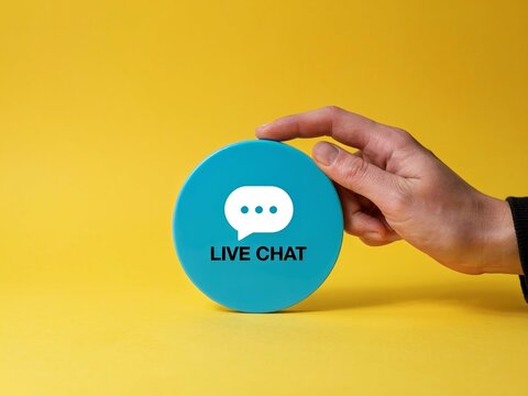 Hand Holding Live Chat Icon for Online Customer Support Service
