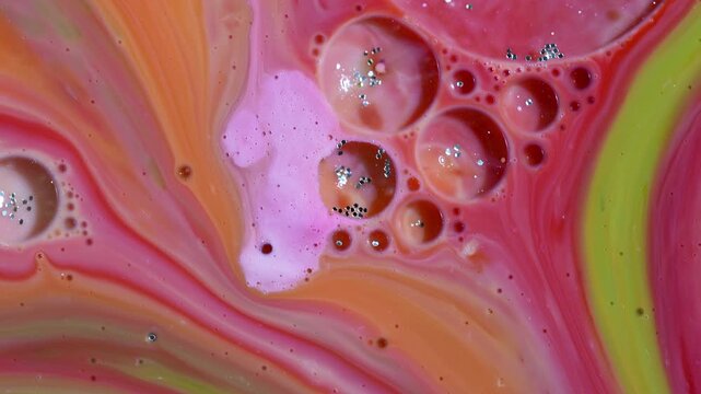 Swirling Magenta, Orange, and Neon Green Paint with Glitter Cells