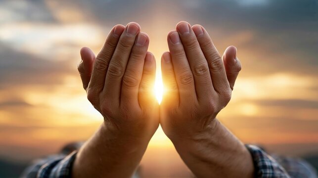 Human hands palms up praying and worship of cross, eucharist therapy bless god helping, hope and faith, christian religion concept on sunset background.
