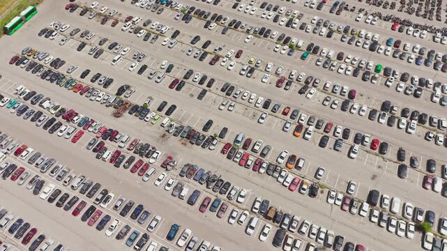 Aerial view of a car impound lot with damaged cars after an accident or towed for illegal parking.