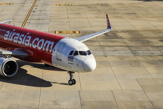 Don-Mueang International, Thai AirAsia Airbus A320 taxi in taxiway after landing, drive to passenger gate. 