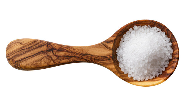Isolated wooden spoon filled with coarse sea salt crystals for cooking and seasoning purposes