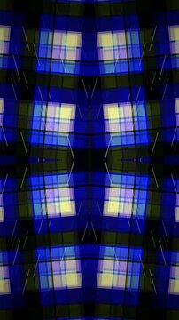 Vibrant plaid pattern with blue, green, and yellow hues on fabric