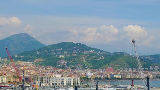 4K drone video footage of Salerno. Aerial panorama of Salerno city, harbor and Bay of Salerno, stunning Mediterranean coastline and historic urban landscape in Campania, I