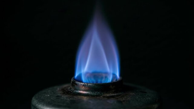 Clean blue methanol flame burning on a burner, marine fuel