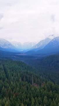 Aerial time-lapse of stunning mountain landscape in winter. Taken near Vancouver