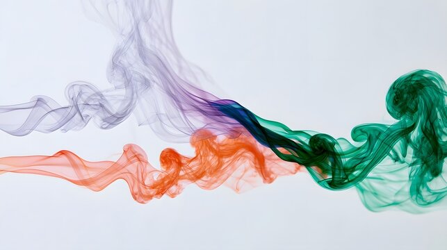 Vibrant colored smoke swirls flow gracefully across a plain white background in an abstract ic composition