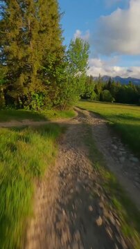The breathtaking agile flight along the path in Tantra mountains. Poland
