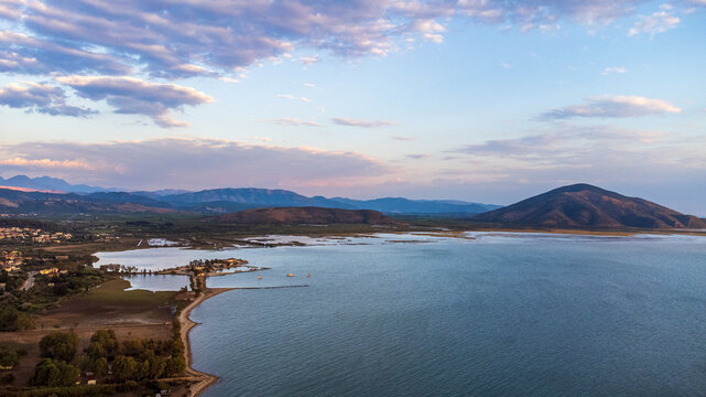 Aerial view of Sagiada lagoon and gulf in Greece at sunset light