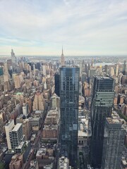 Fototapeta premium Aerial view of the Empire State Building and Midtown Manhattan skyline, New York City, USA