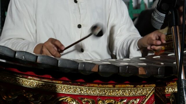 Playing Thai xylophone