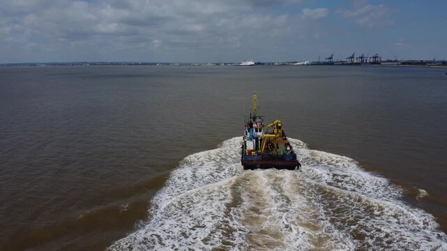 Drone view of a mini dredger carrying out maintenance work on the River Humber. 