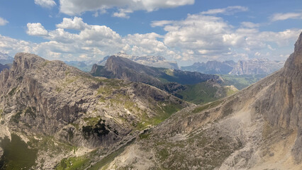 Italian dolomites mountains with valleys and green alpine pastures © procinemastock