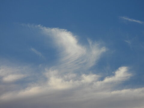 The tranquil formations of evening clouds in the sky. Cloudscape in the skies over Assateague Island National Seashore, Worcester County, Maryland.