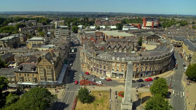 Aerial footage slowly ascending above the Harrogate Cenotaph war memorial in North Yorkshire, England