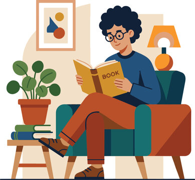 Man reading book on couch indoors.