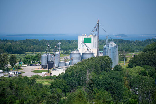 Agricultural Grain Silos and Rural Landscape Along the St. Lawrence Estuary in Quebec