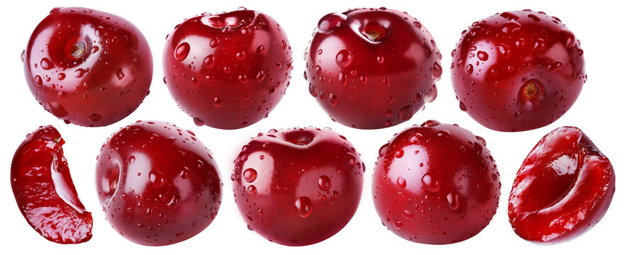Set of juicy ripe sweet cherries with water drops isolated on transparent background.