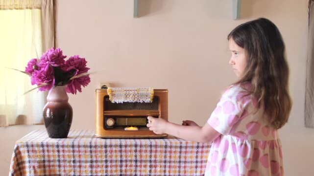 Young girl in a strawberry patterned dress exploring a nostalgic. Old fashioned world