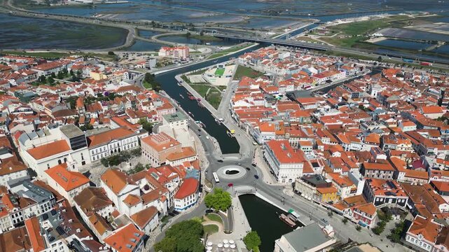 Drone view of Aveiro city center, streets, river, urban landscape