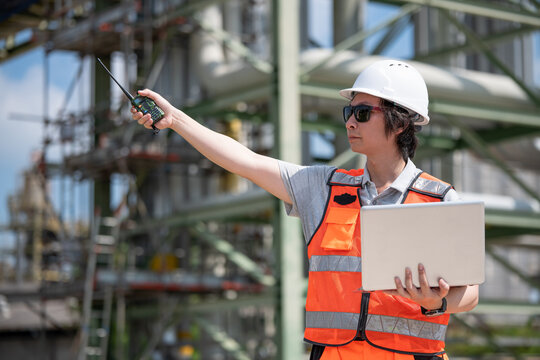 Refinery industry, engineer working in industrial production, oil and gas refinery plant industry factory.