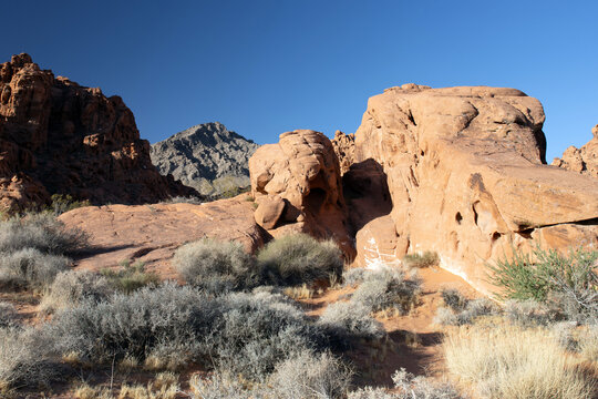 View of the iconic red Aztec sandstone and muted gray limestone formations at Valley of Fire State Park in Nevada
