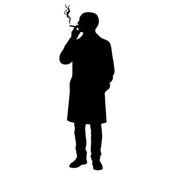 Silhouette of Man Smoking Cigarette in Profile.