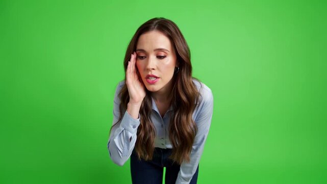 Woman whispering secret symbolizing hidden truth and confidential communication expressing secrecy and trust on green screen background