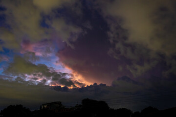 Obraz premium Night sky with clouds and the Milky Way. The beauty of nature.