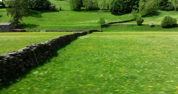Flying over wildflower meadow in Yorkshire Dales