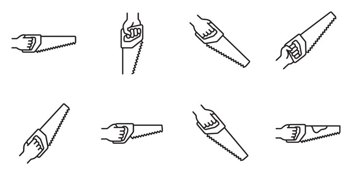 Hand holding and using saw for woodworking and construction.