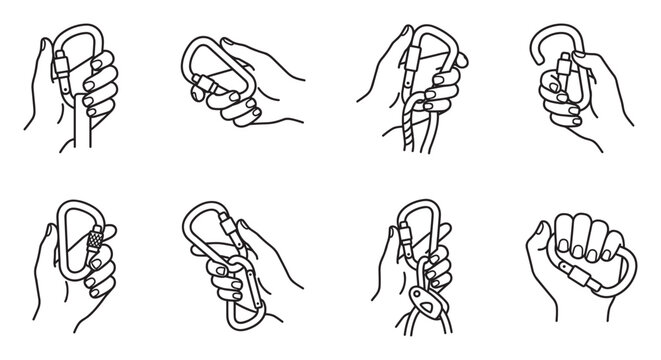 Hand holding carabiner various grips and attachments for climbing and safety.