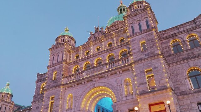Victoria, BC, Canada &ndash; July 8, 2026: Facade of British Columbia Parliament Buildings illuminated at twilight