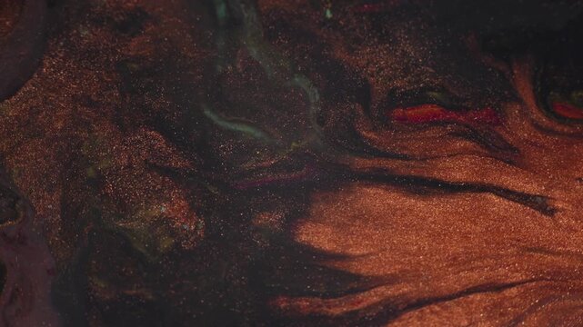 Elegant dark abstract fluid art background with glowing red and golden swirls. Macro video of flowing liquid acrylic paint in vibrant colors, creating dynamic abstract motion