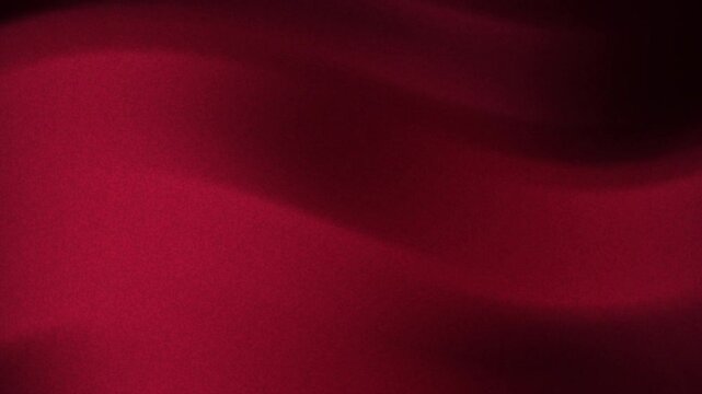 dark red gradient background satin fabric with smooth waves and elegant texture perfect for luxury fashion, home decor, or background design projects.