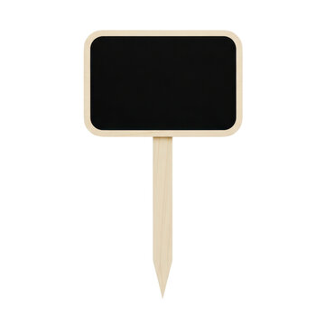 A rectangular black sign with a gold border on a stick.