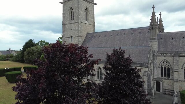 St Margaret's Marble church aerial view ascending the neo gothic spire steeple tower in Rhyl parish