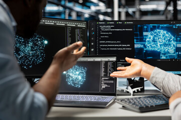 Fototapeta premium Server farm engineering team looks at data analysis graph