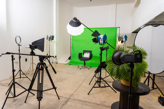 Studio production set with green screen and film equipment