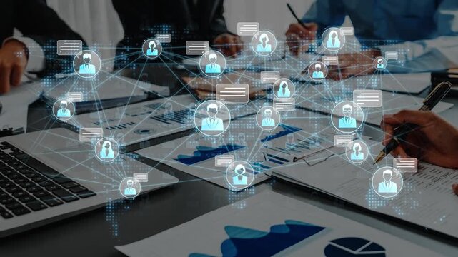 Business team collaborating on project development with digital networking graphics illustrating global connectivity and data exchange in modern workspace solutions Sigmoid