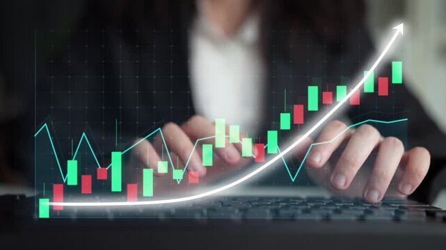A professional setting featuring hands typing on a keyboard, with a virtual stock market graph symbolizing financial growth and investment opportunities in business. Copula